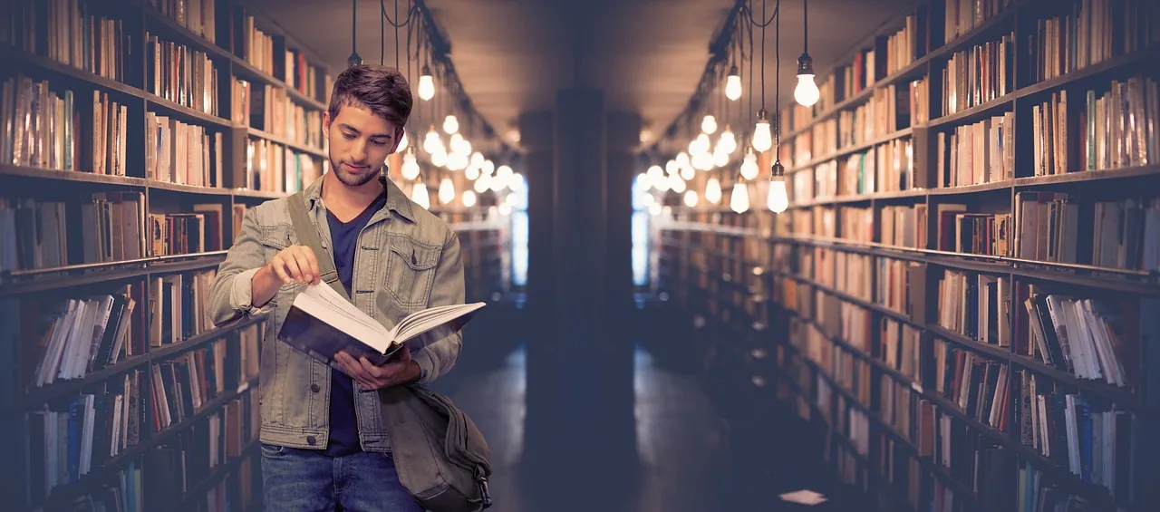 A student reading in a library